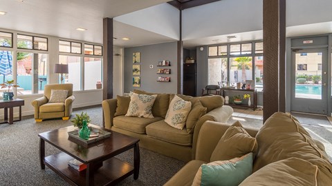clubhouse with couches and lots of windows
